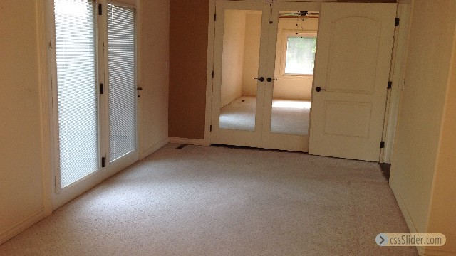 Master Bedroom with French Doors to beautiful patio